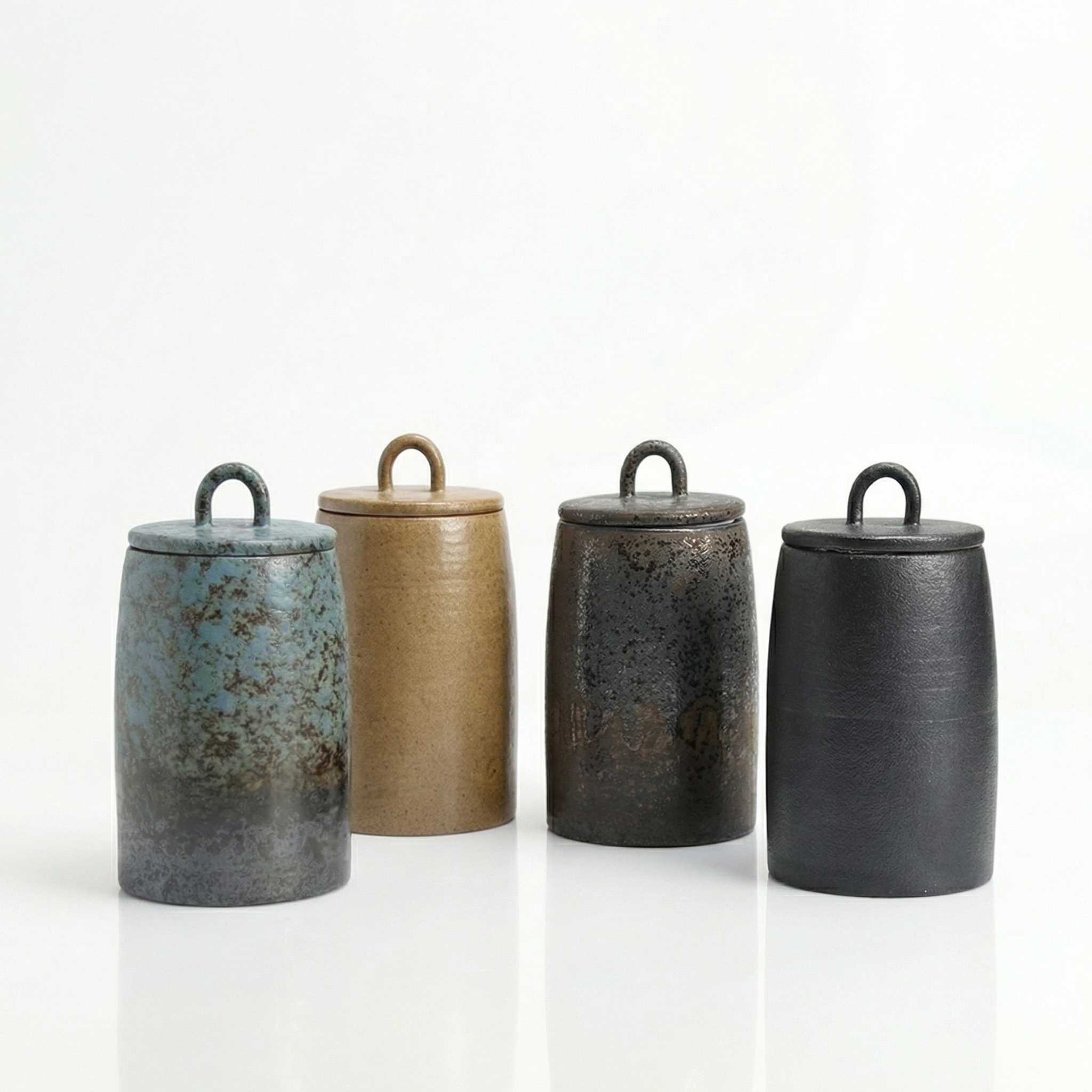 Collection de quatre grandes boites a the japonaises en gres bleu patine kaki brun fonce et noir mat