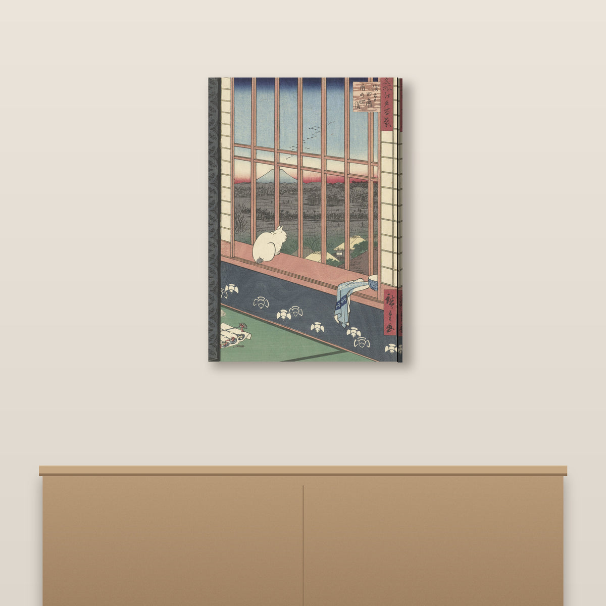 Le chat à la fenêtre d'Hiroshige en toile sur châssis, accroché au-dessus d'une console en bois clair